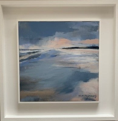 Frayed edge of sand and silver pearls